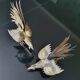 Duo of gold metal roosters 1950