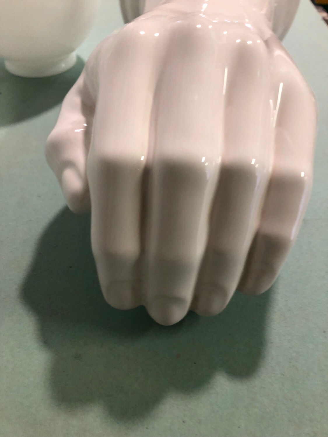 Ceramic hand wall lamp