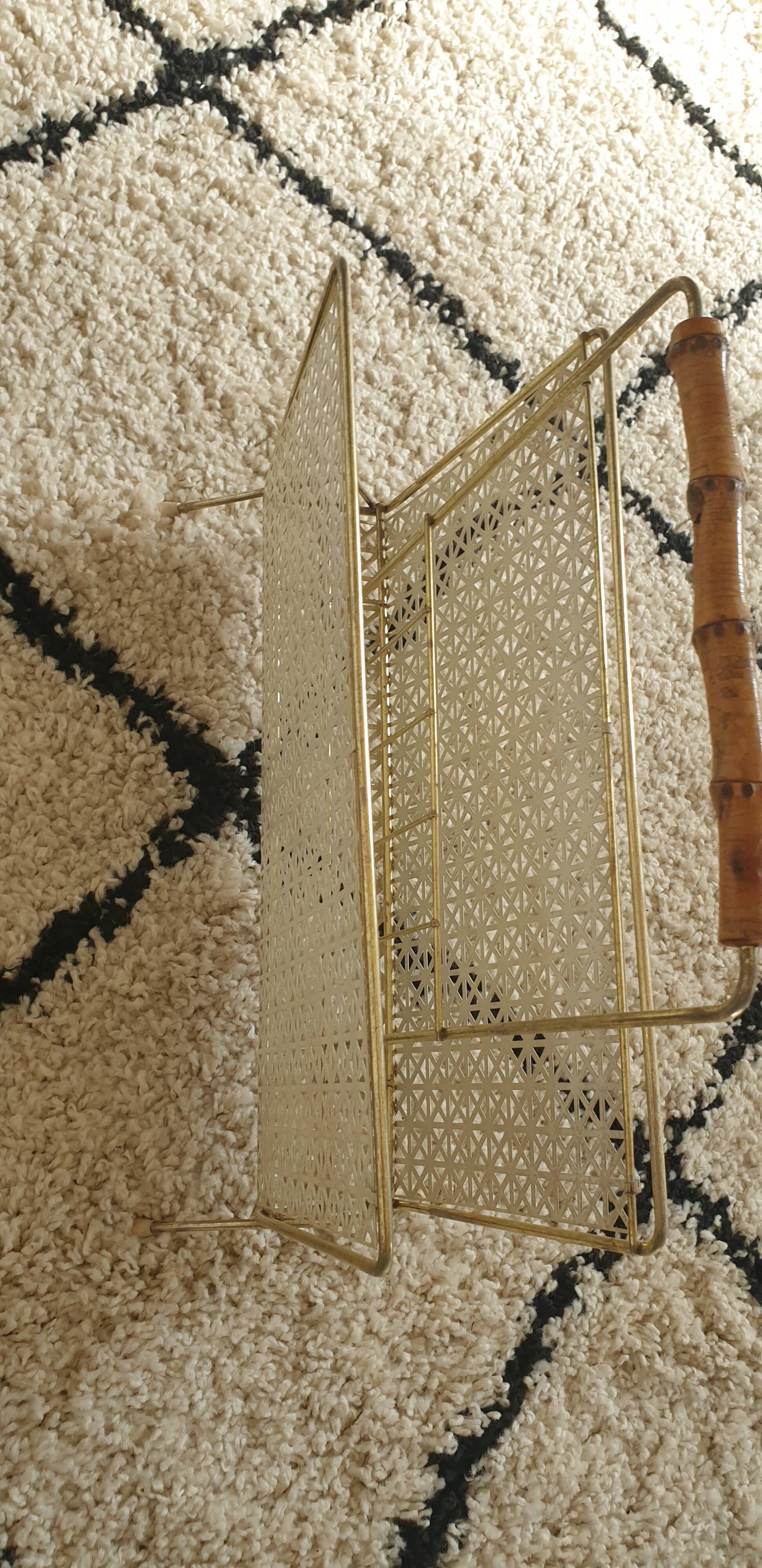 Perforated metal review door