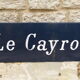 Plaque signalisation vintage bleu Le Cayrou