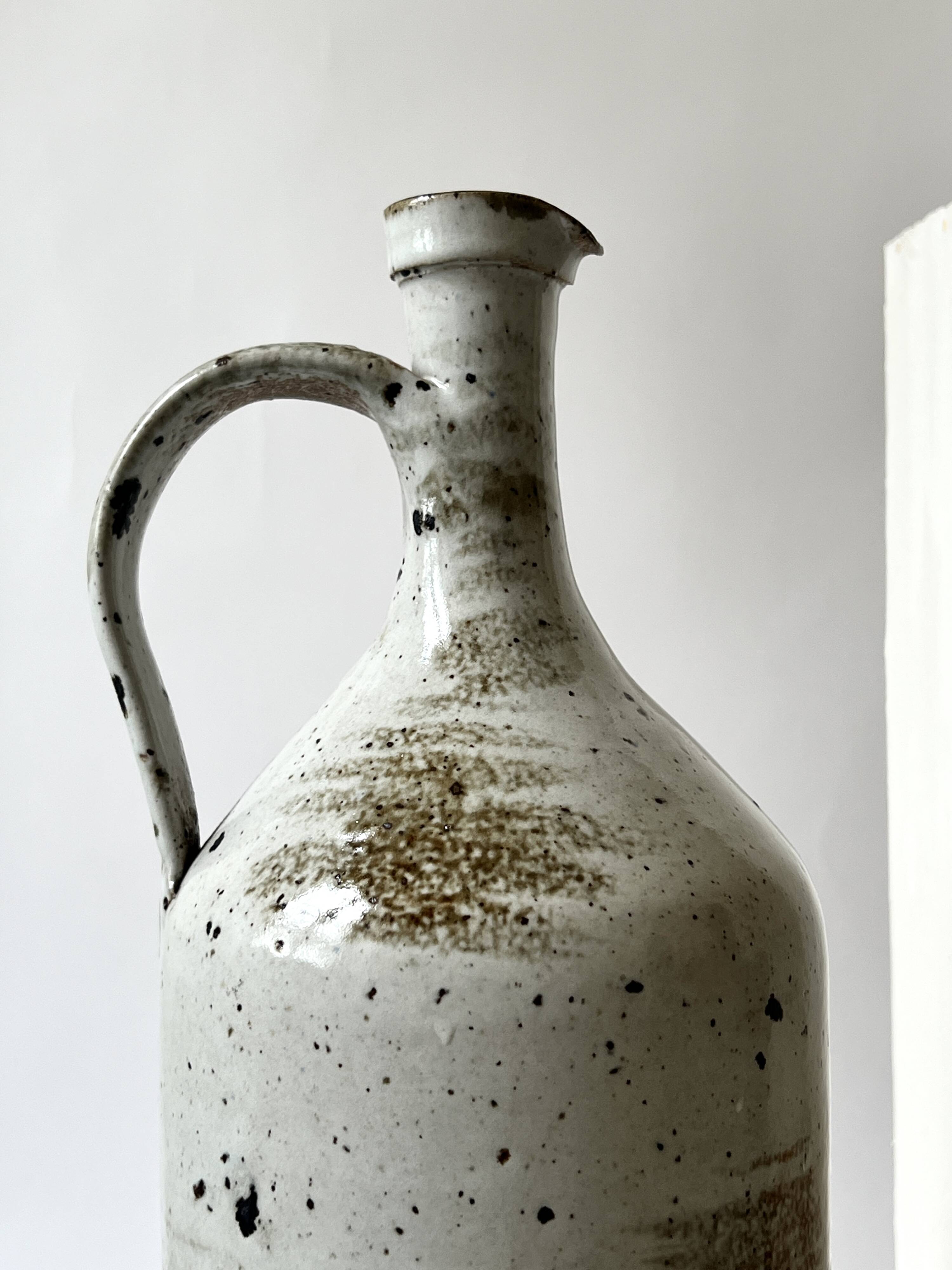 Large enamelled stoneware jug signed Albert Breton, FR Vézelay.