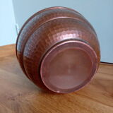 Dented copper vase or jug