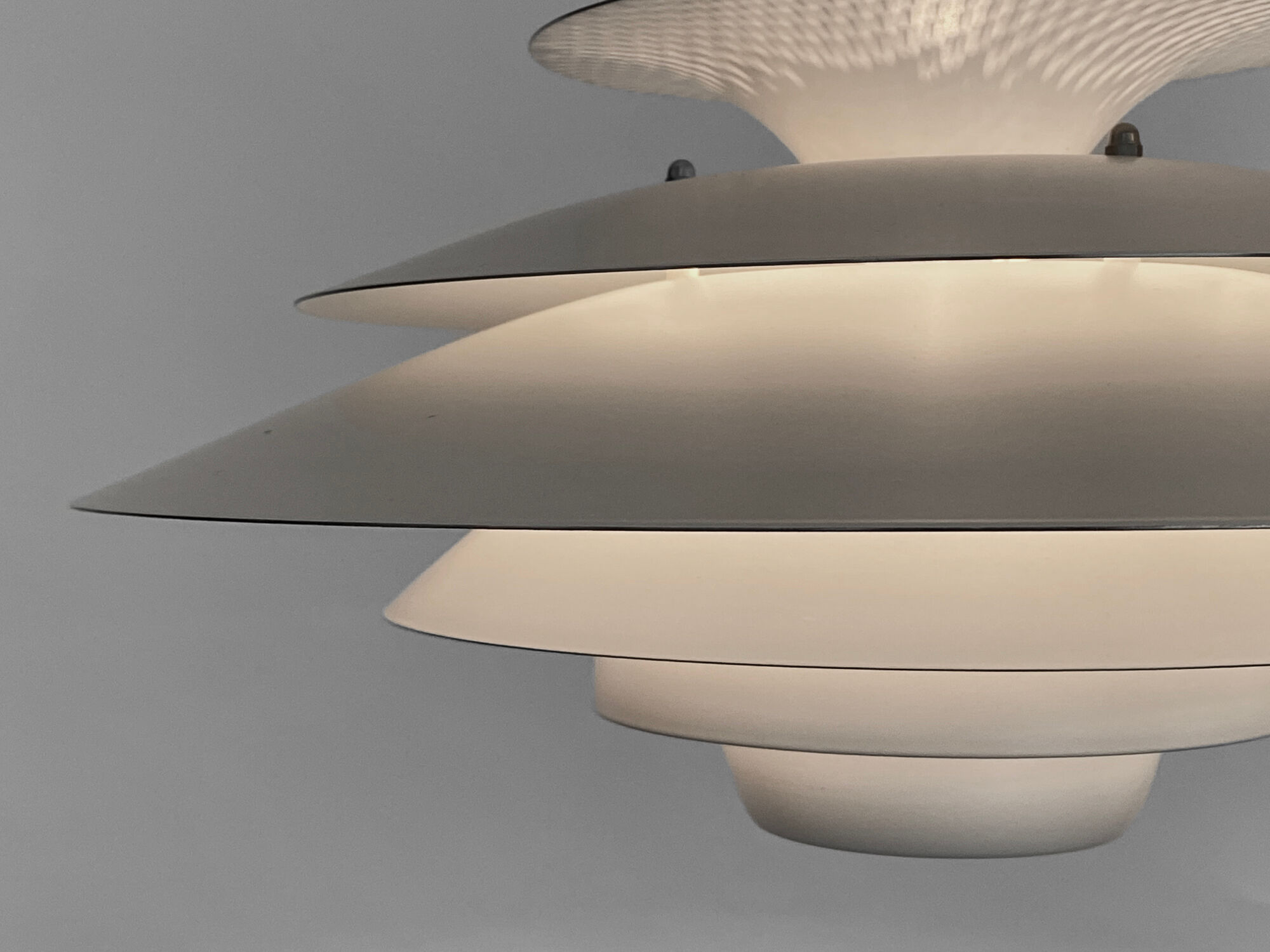 Multi layered pendant light by Kurt Wiborg for Jeka Metaltryk. Denmark 1970s