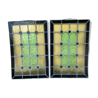 Pair of stained glass windows with geometric patterns late nineteenth century