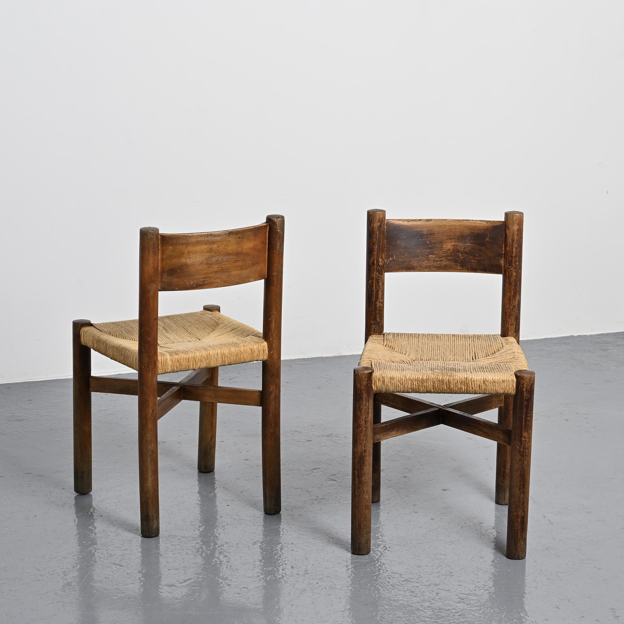 Pair of Méribel chairs by Charlotte Perriand, vintage edition BCB, circa 1950.