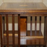 Sheraton Revival rotating library table in walnut and satin wood.