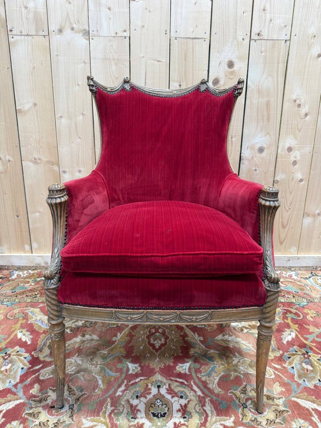 Art Nouveau gondola armchair – Carved wood & red theatre velvet – France