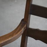 A pair of modern and sculptural vintage Danish armchairs in oak and papercord, 1940s.