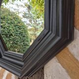 Octagonal black wood mirror