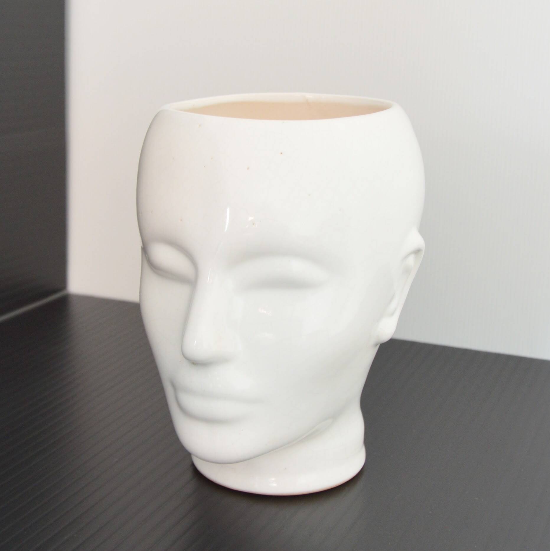 Earthenware cachepot or vase with a head, 1970