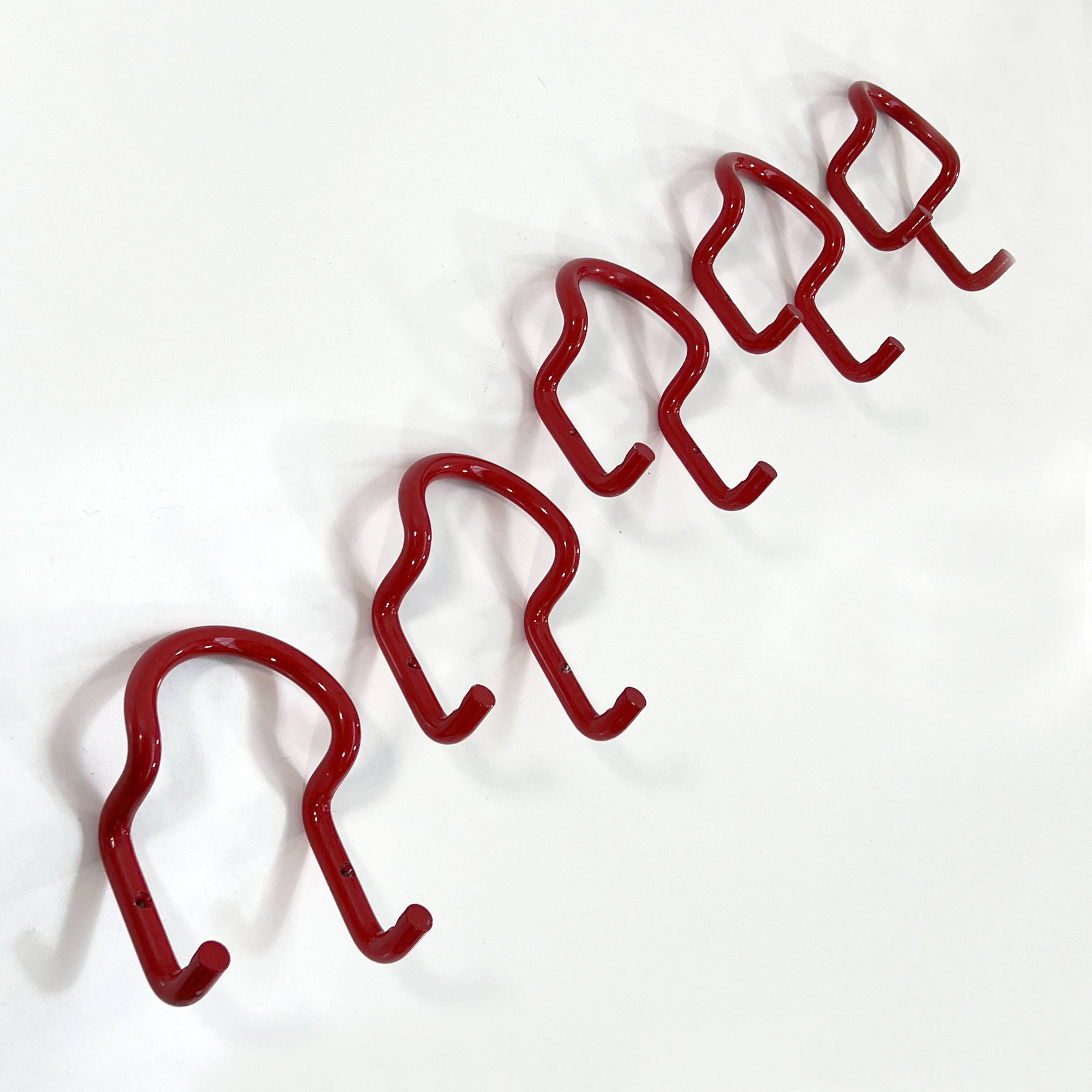 Set of 4 "taka" pink coat hooks by Cesare Rota Nodari for Acerbis, 1960.