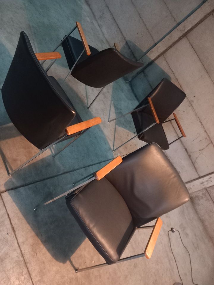 4 vintage design dining chairs in black leather mauser werke germany 1960s