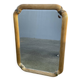 Miroir doré contour ligné