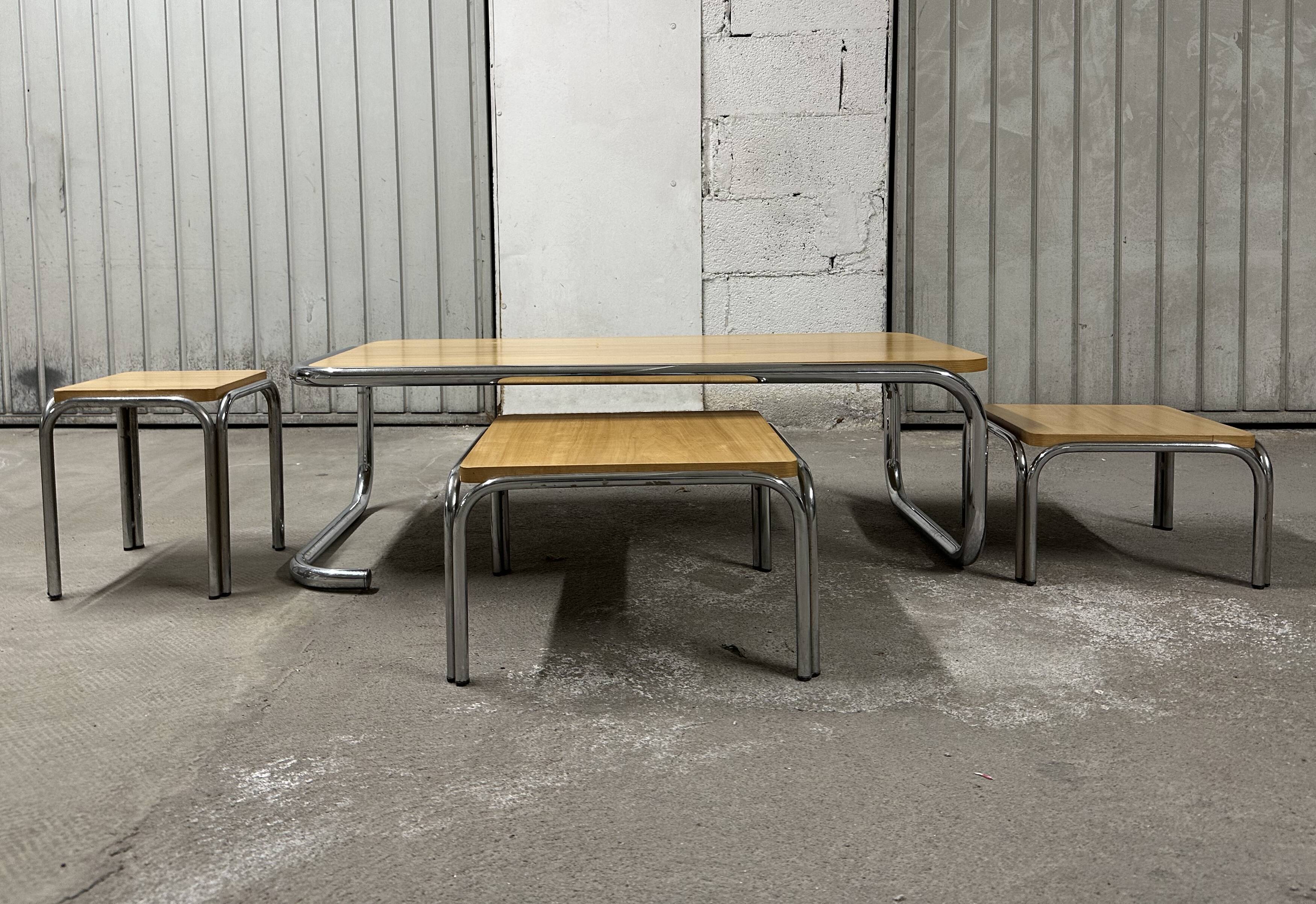 Set of 4 nesting coffee tables from the 70s, metal and solid oak.