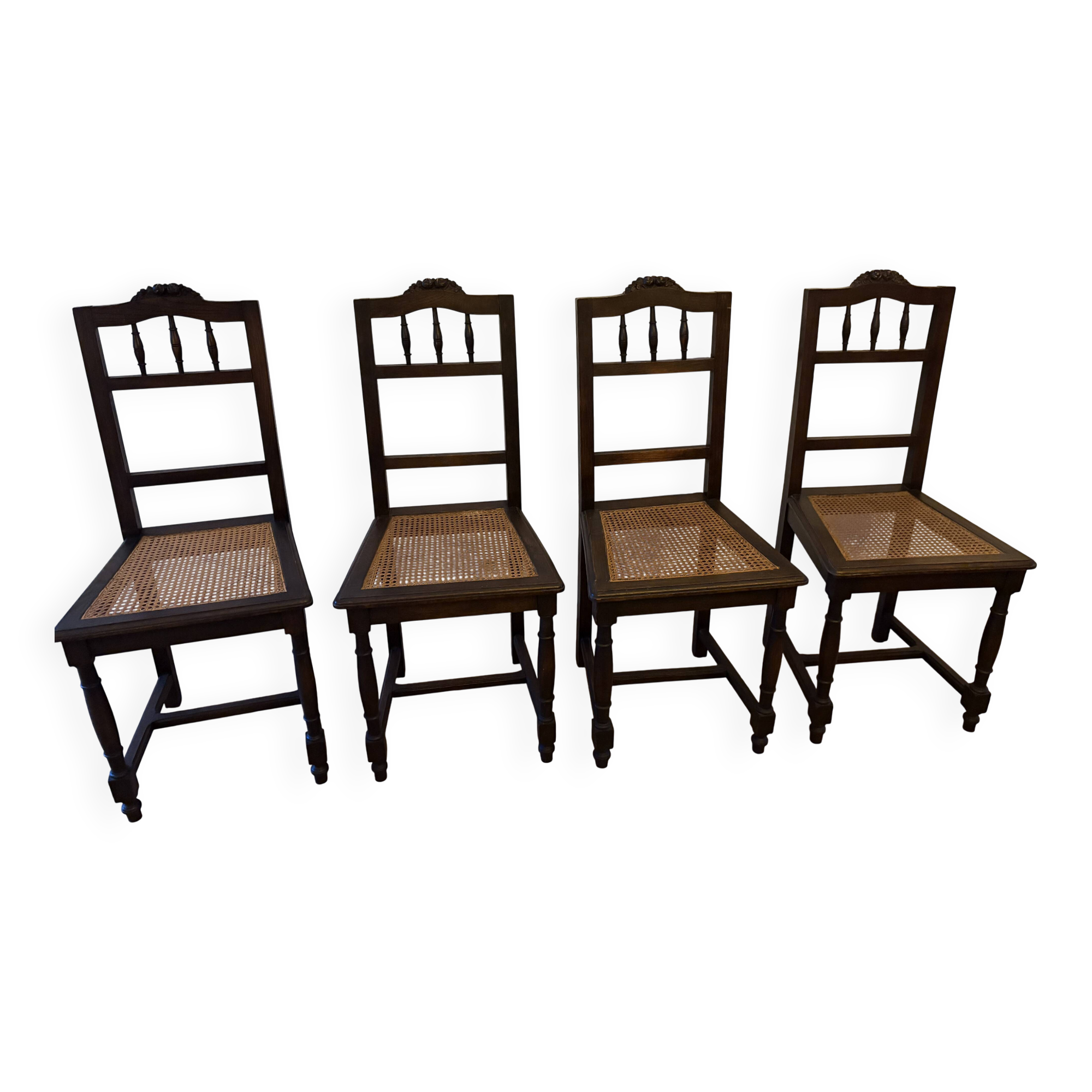 Lot of 4 solid oak chairs with caning in the Henri II style.