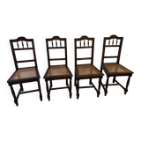Lot of 4 solid oak chairs with caning in the Henri II style.