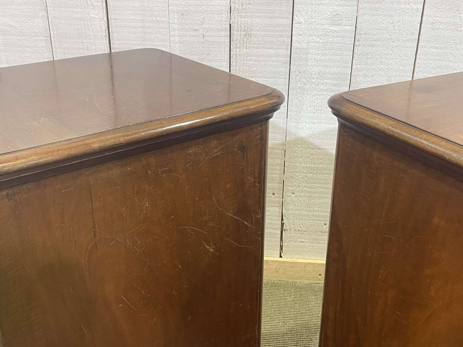 Pair of English mahogany bedside tables from the early 20th century