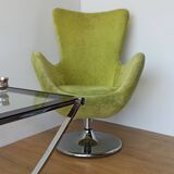 Bucket seat in chrome and green.