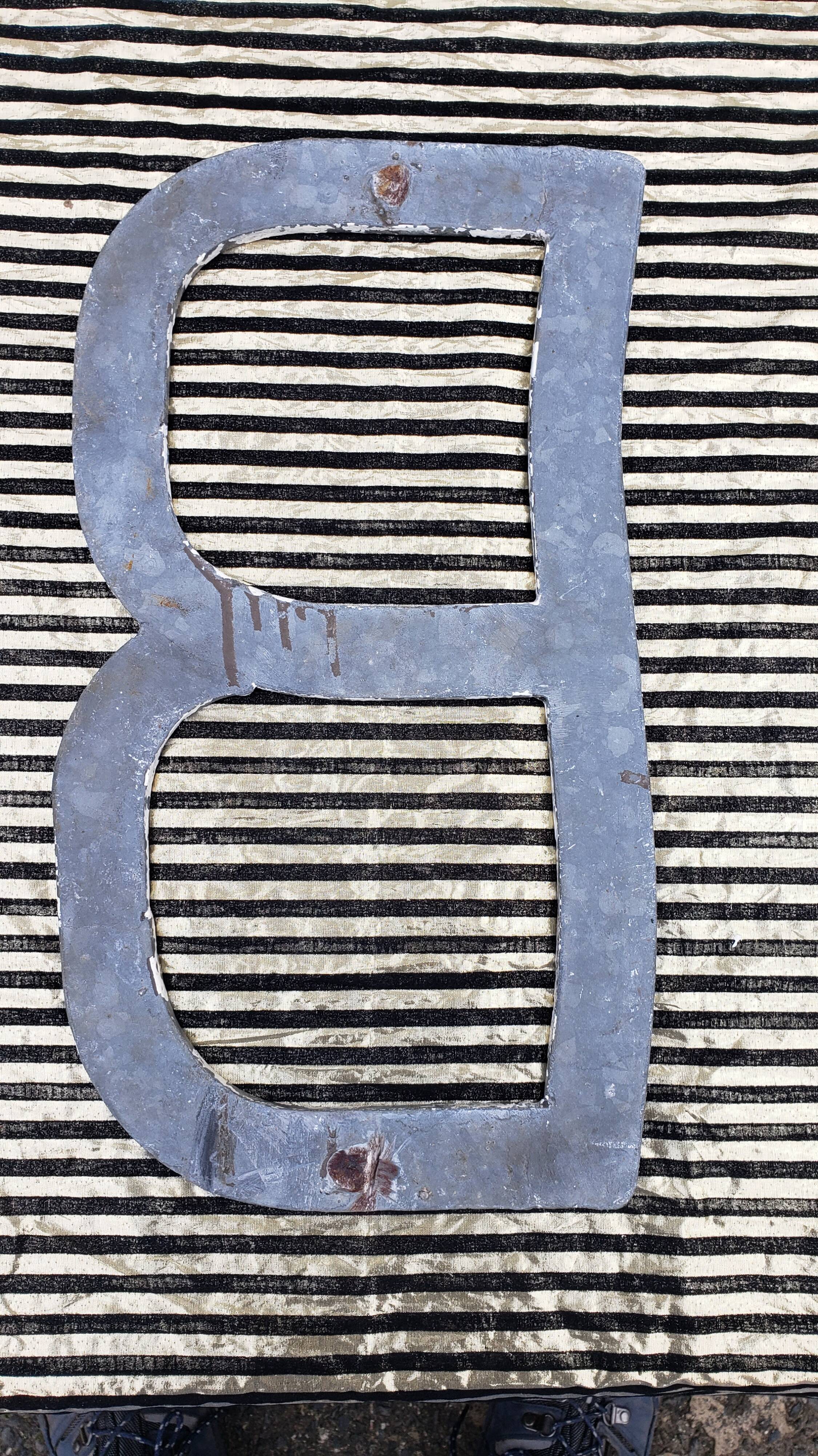 Letter B in galvanized metal