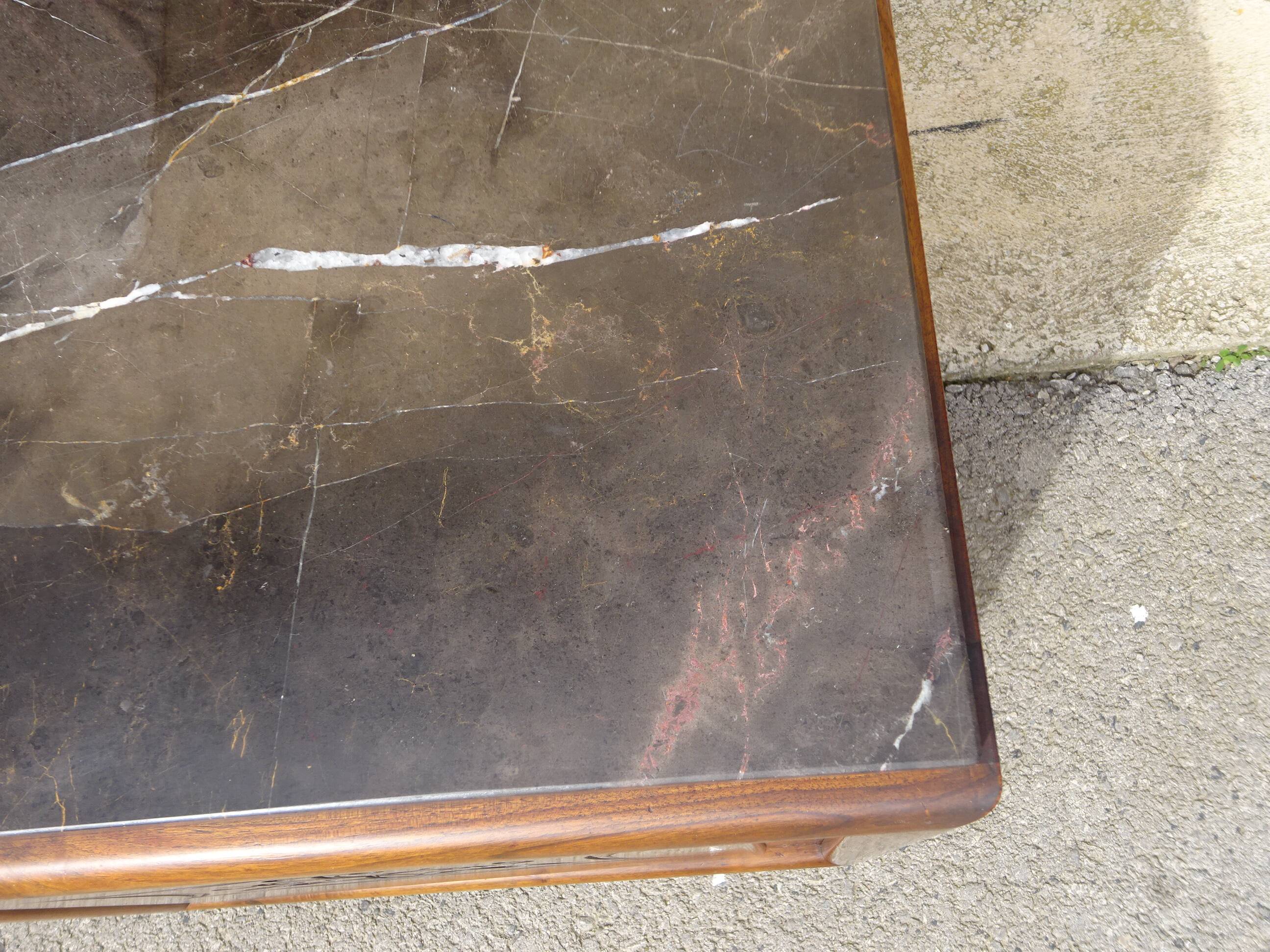 Solid walnut sideboard, moustache legs, black marble top.