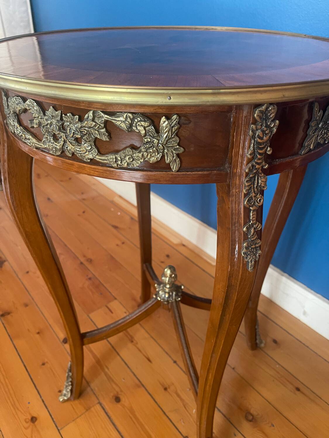 High wooden pedestal table
