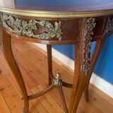 High wooden pedestal table