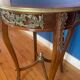 High wooden pedestal table
