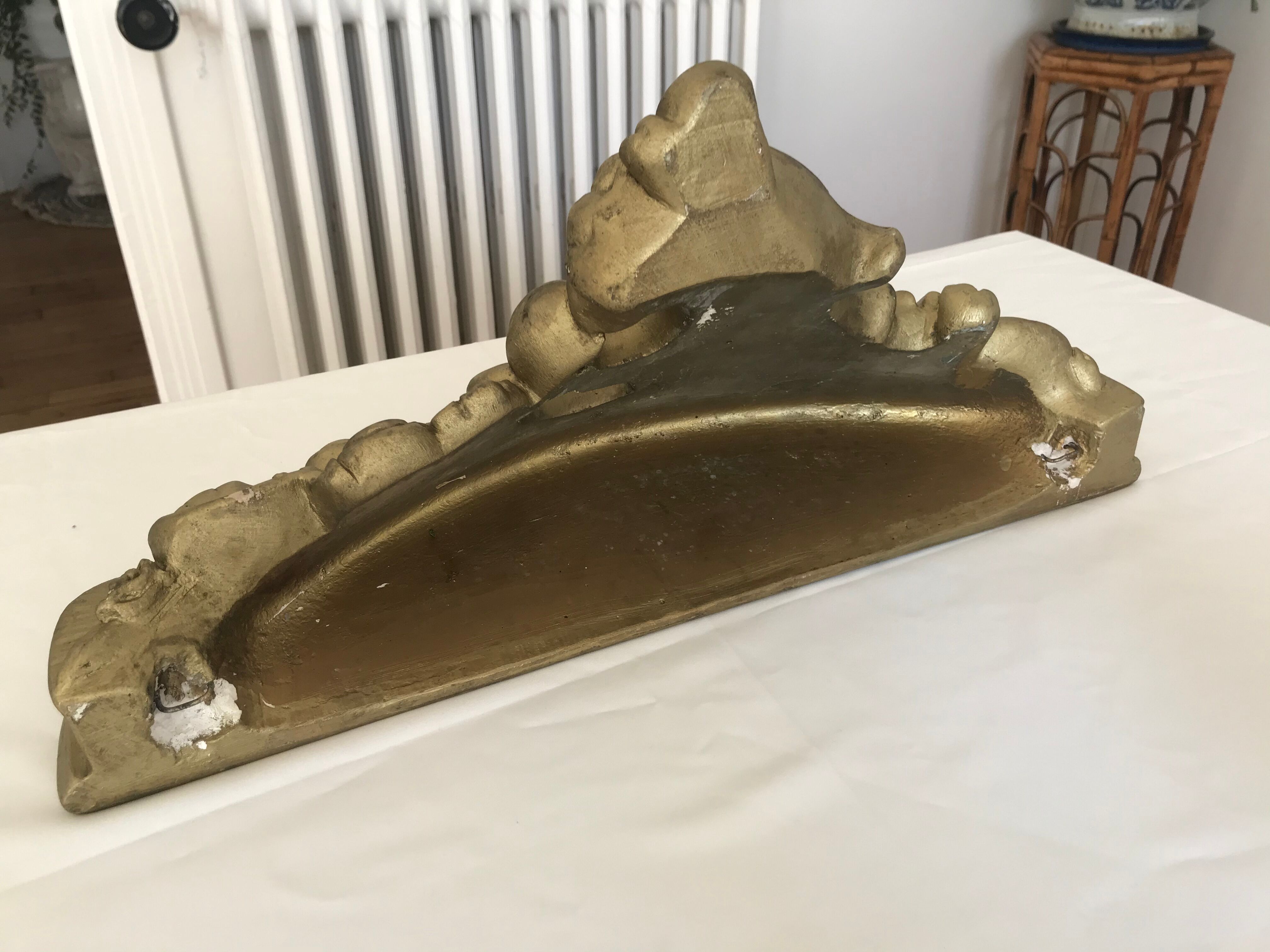 Gold plaster wall shelf