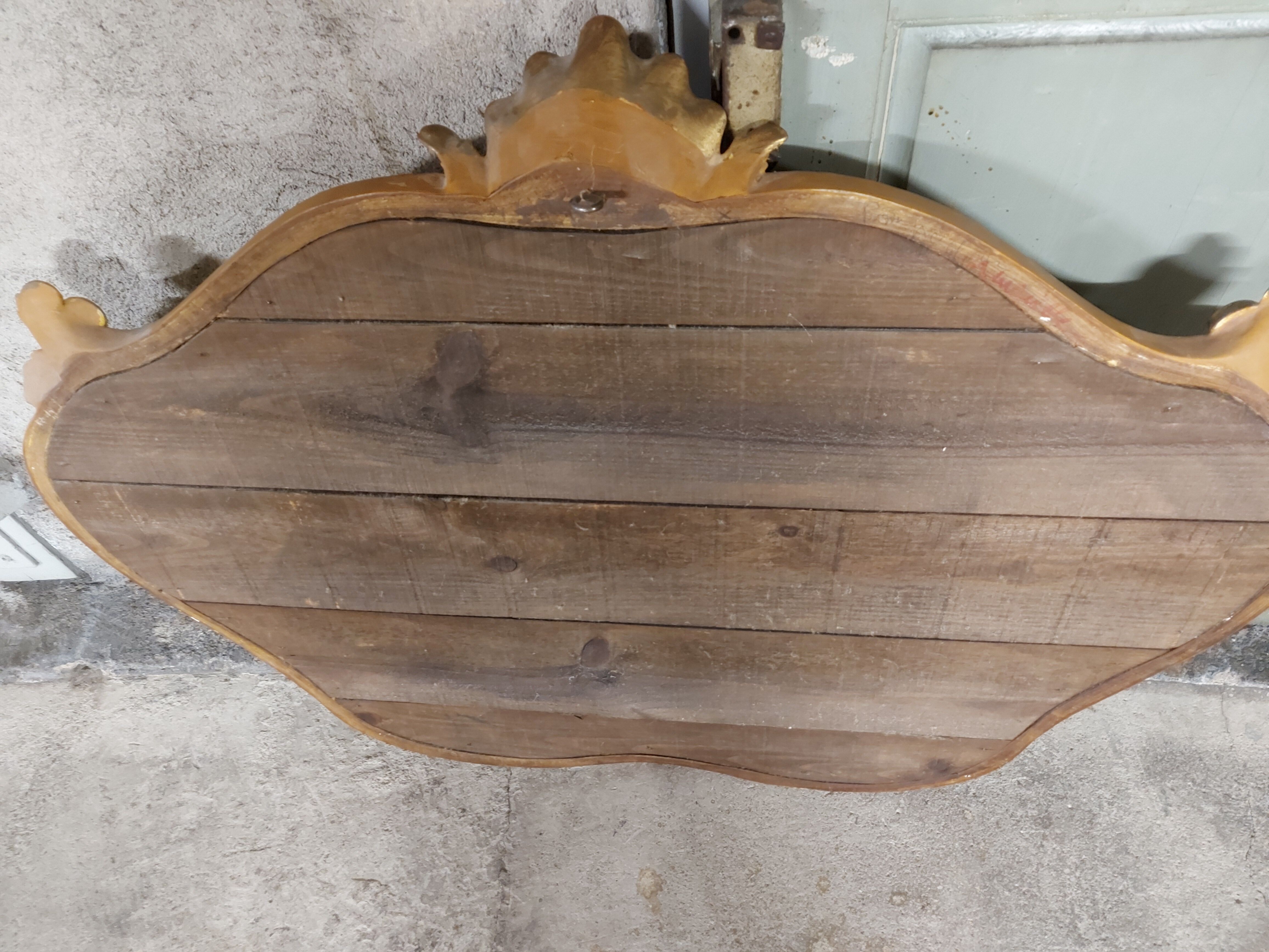 Old gilded wood mirror