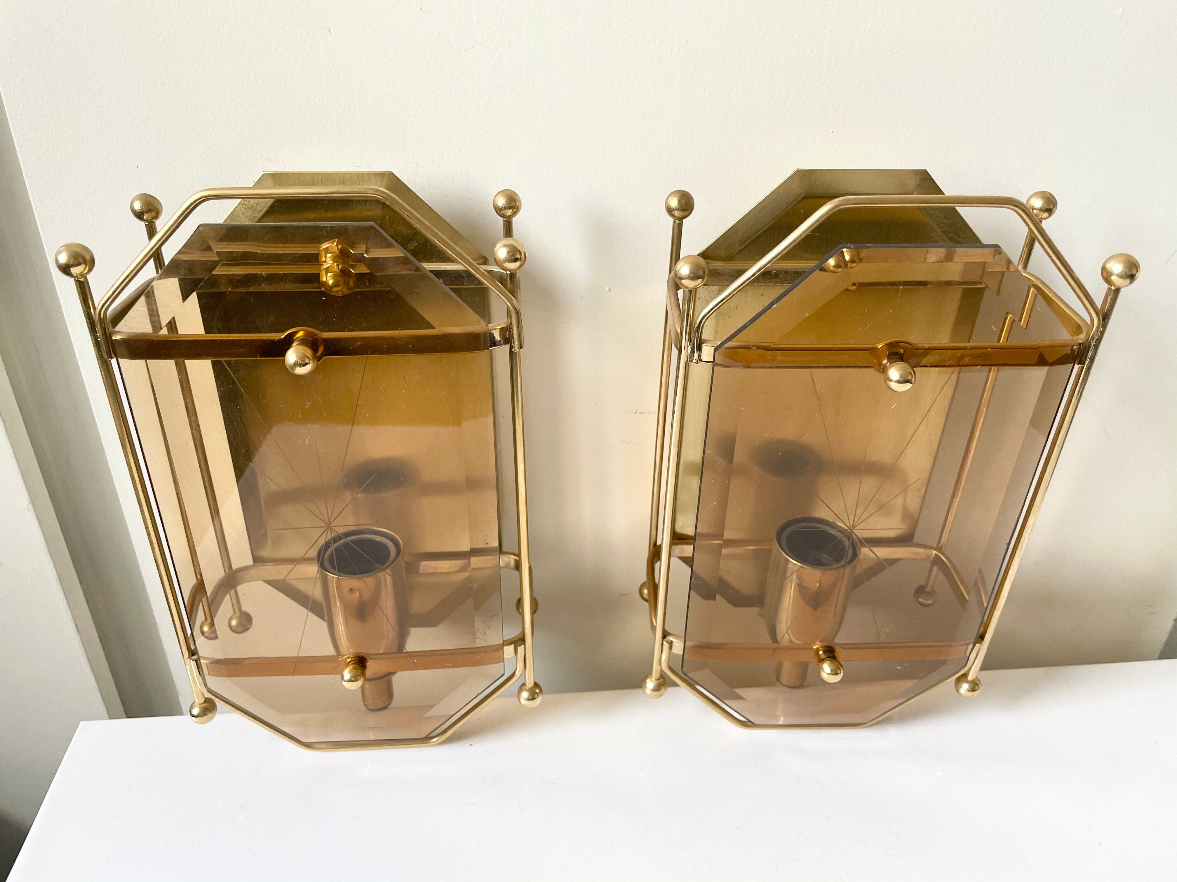 Pair of Scandinavian Vintage  wall light Sconce in Brass & Amber colored Glass