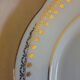 Suite of 14 flat plates golden white porcelain