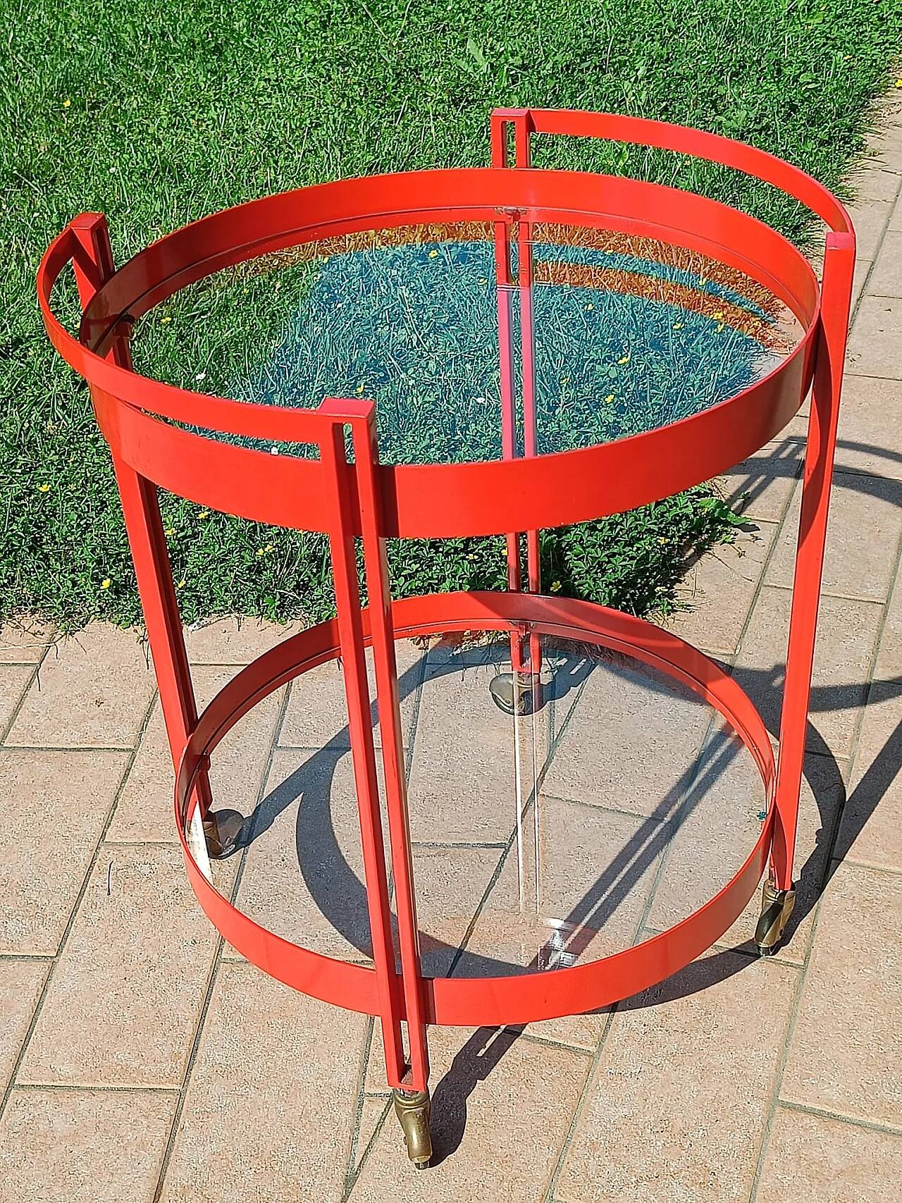 1970s bar trolley, red metal and double glass shelf.