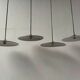 Suspensions in enamelled sheets