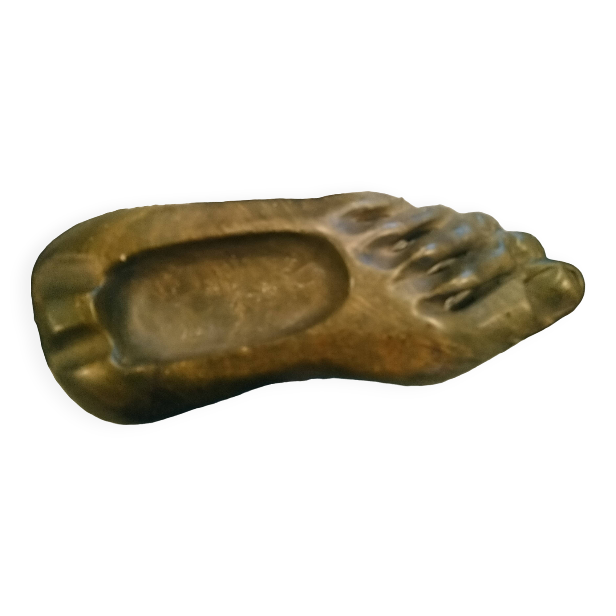 Ashtray in carved and polished stone.