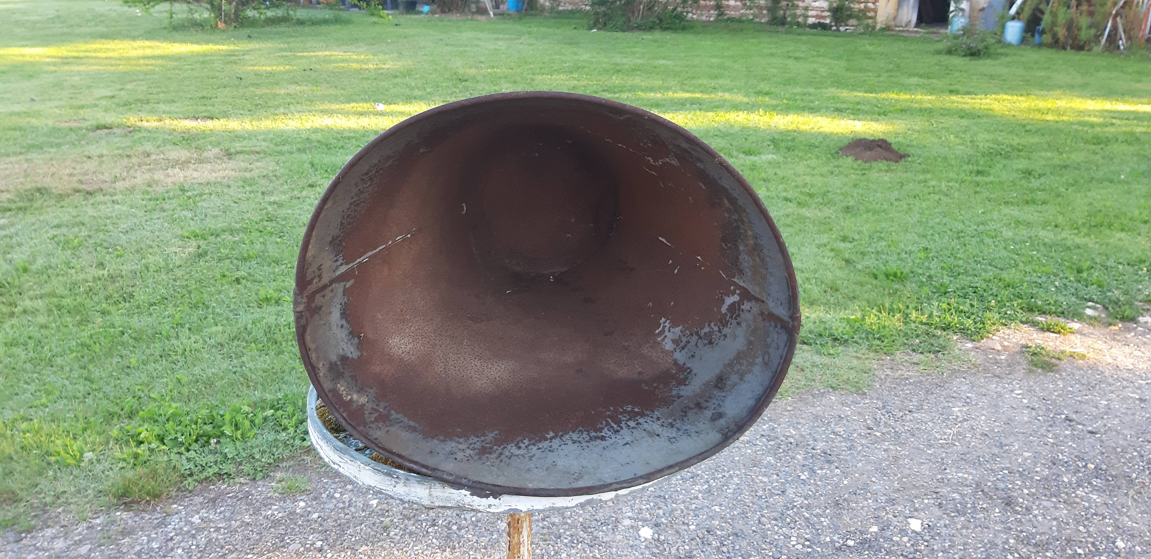 Galvanized metal and leather harvest hood