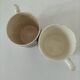 Pair of antique Saint-Amand cups – Floral decoration 4146 (1930s–50s)