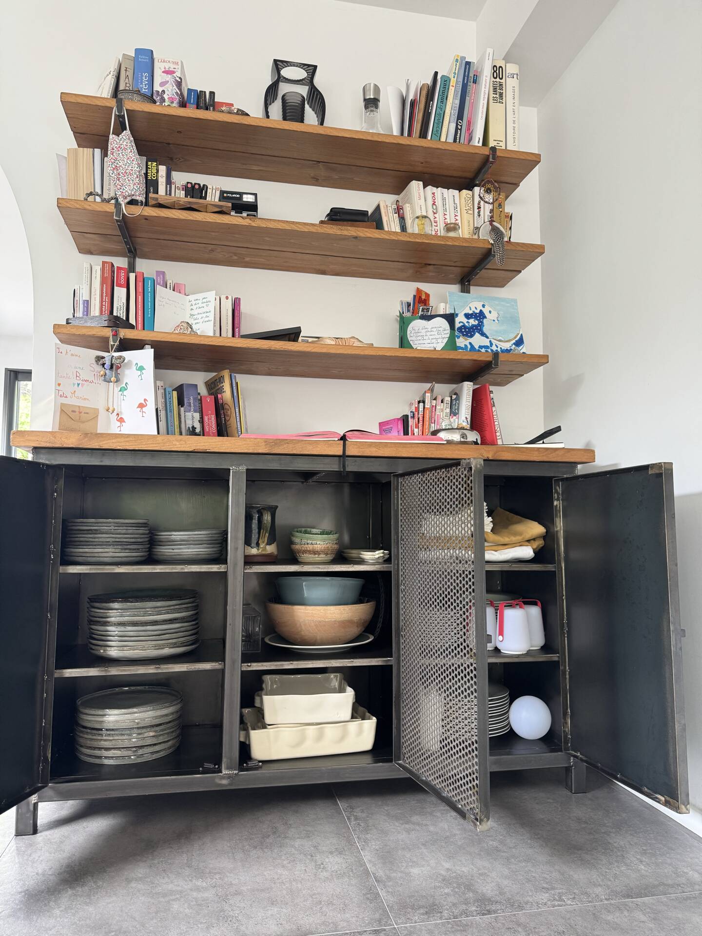 Metal and wood shelves and cupboards.