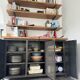 Metal and wood shelves and cupboards.