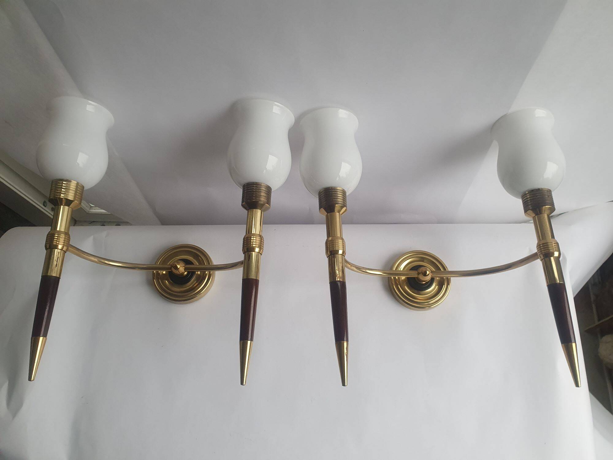 Pair of large torch-style wall sconces from the 1950s