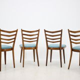 Ensemble de quatre chaises à manger années 1960.