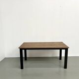 Solid oak dining table from the 70s with metal legs