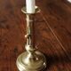 Brass pusher torch candle holder