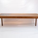 Coffee table in teak with brown ceramic tiles of danish design from the 1960s.