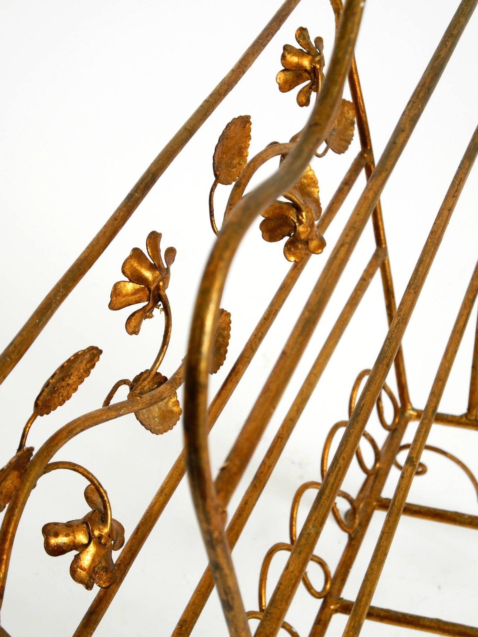 Extraordinary mid-century newspaper and magazine rack with a gilded metal