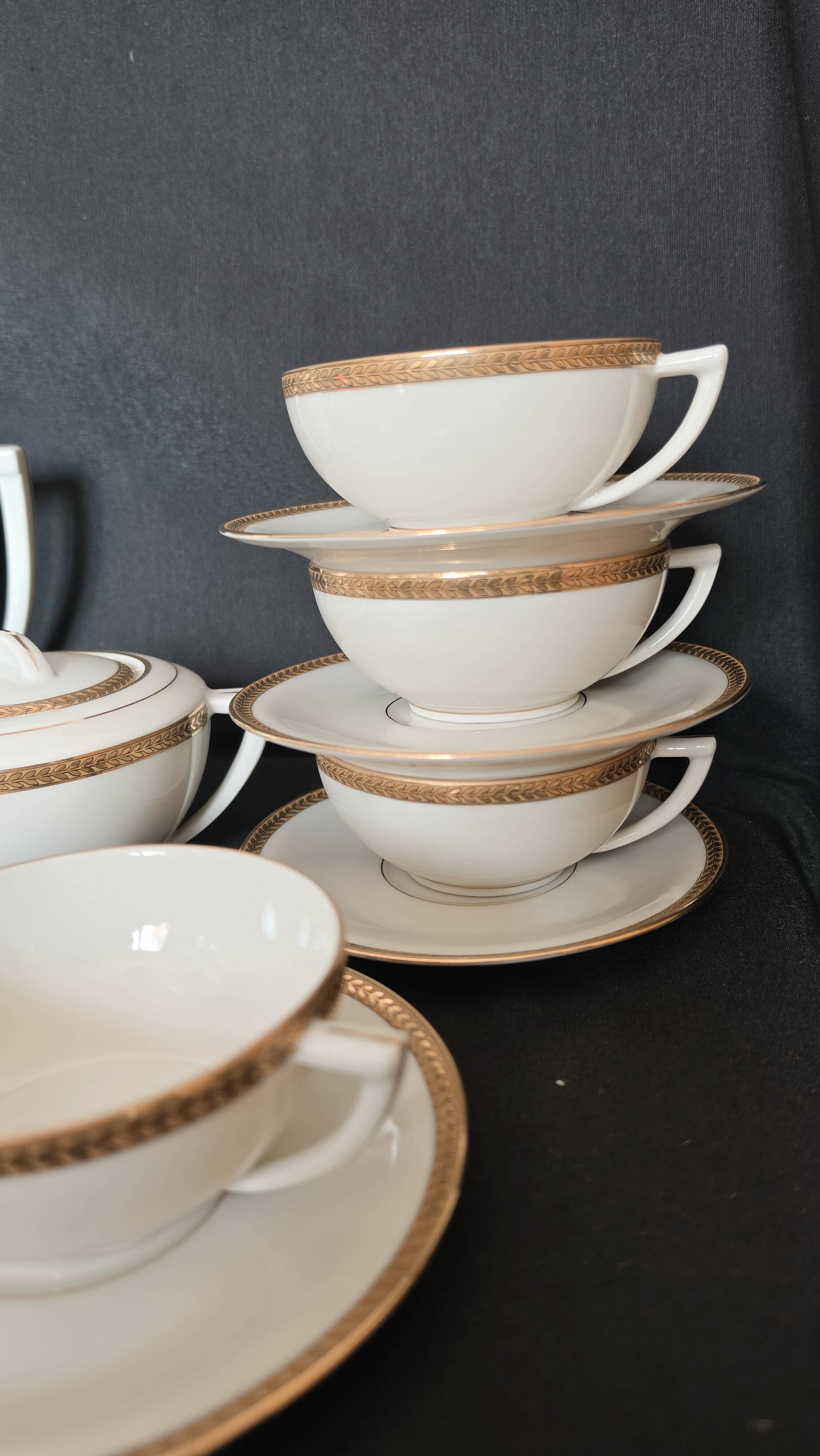 Coffee or tea service in Limoges porcelain and gold, France, Art style.