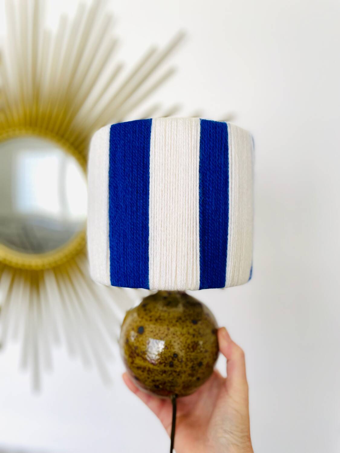 Vintage table lamp with pyrite sandstone base and striped wool lampshade