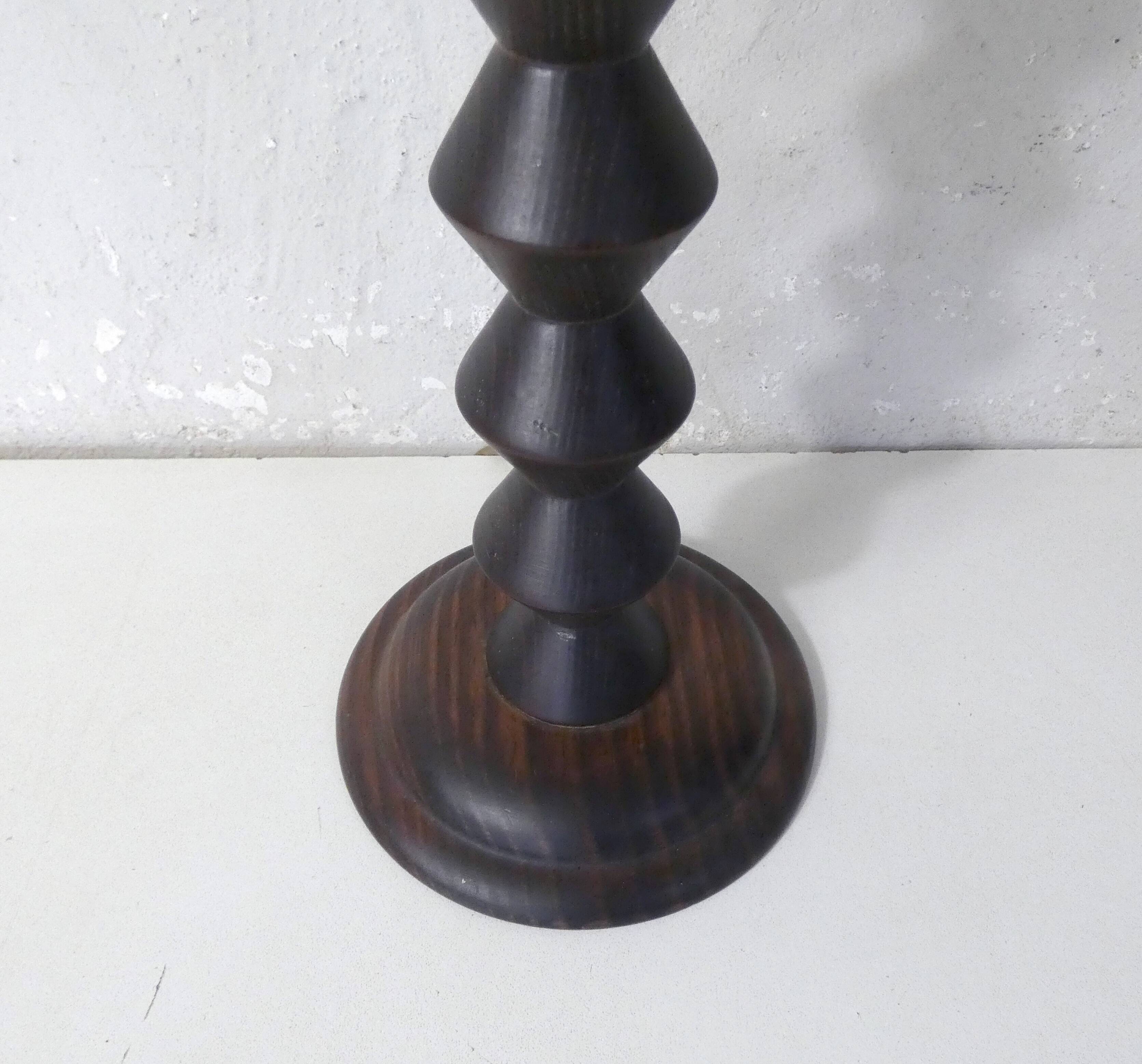 turned wooden lamp with spool base and vintage copper shade