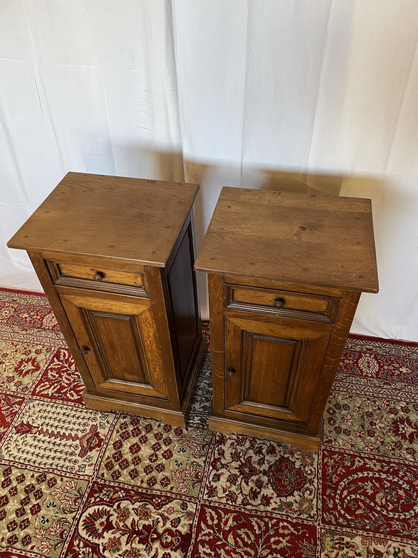 Pair of antique solid oak bedside tables