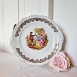 Large serving plate with romantic Frangonard scene with 24 carat gold
