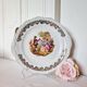 Large serving plate with romantic Frangonard scene with 24 carat gold
